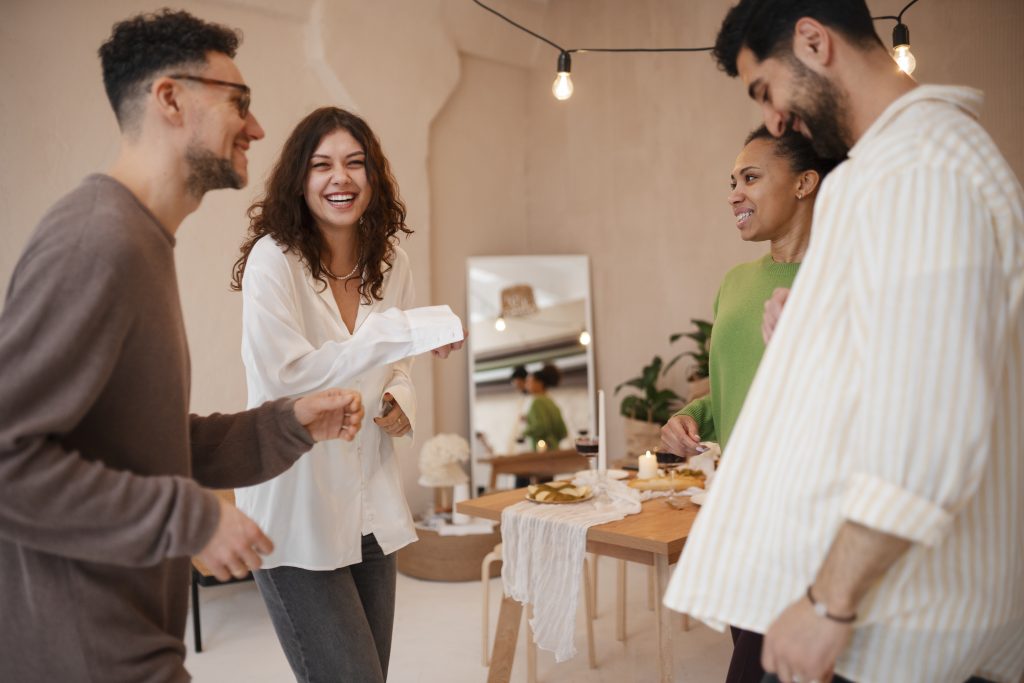 people having casual lunch while enjoying some salsa dancing Real Estate Women people having casual lunch while enjoying some salsa dancing Real Estate Women